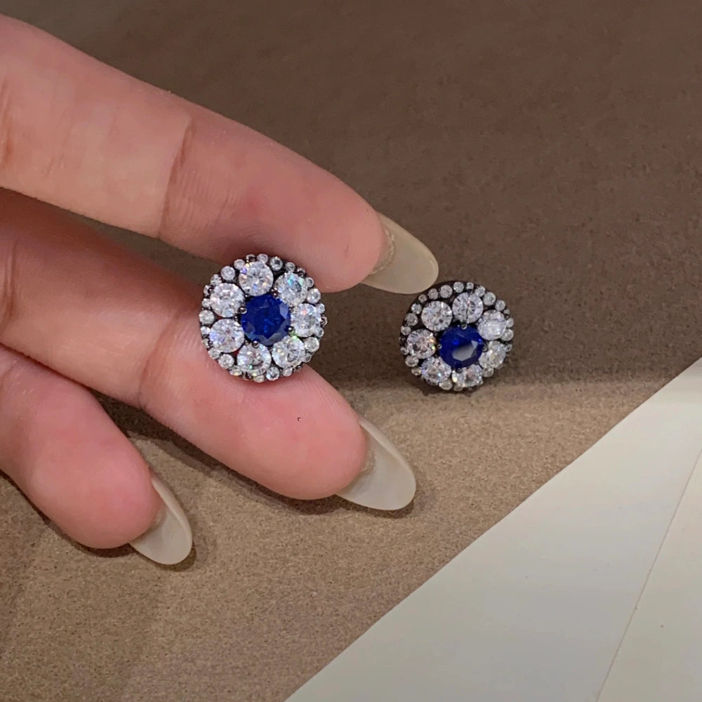 Size comparison of 5mm royal blue cluster stud earrings, measuring 1.5cm x 1.5cm with black gold plating