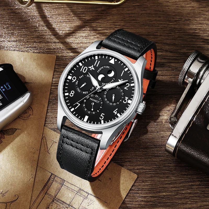 Black genuine leather strap pilot watch with orange inner lining displayed on vintage background