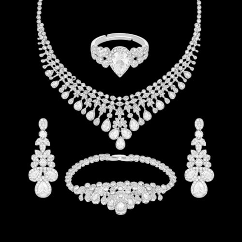 Crystal clear cubic zirconia bridal jewelry set with silver-tone finish. Includes necklace, ring, earrings, and bracelet for weddings and formal wear