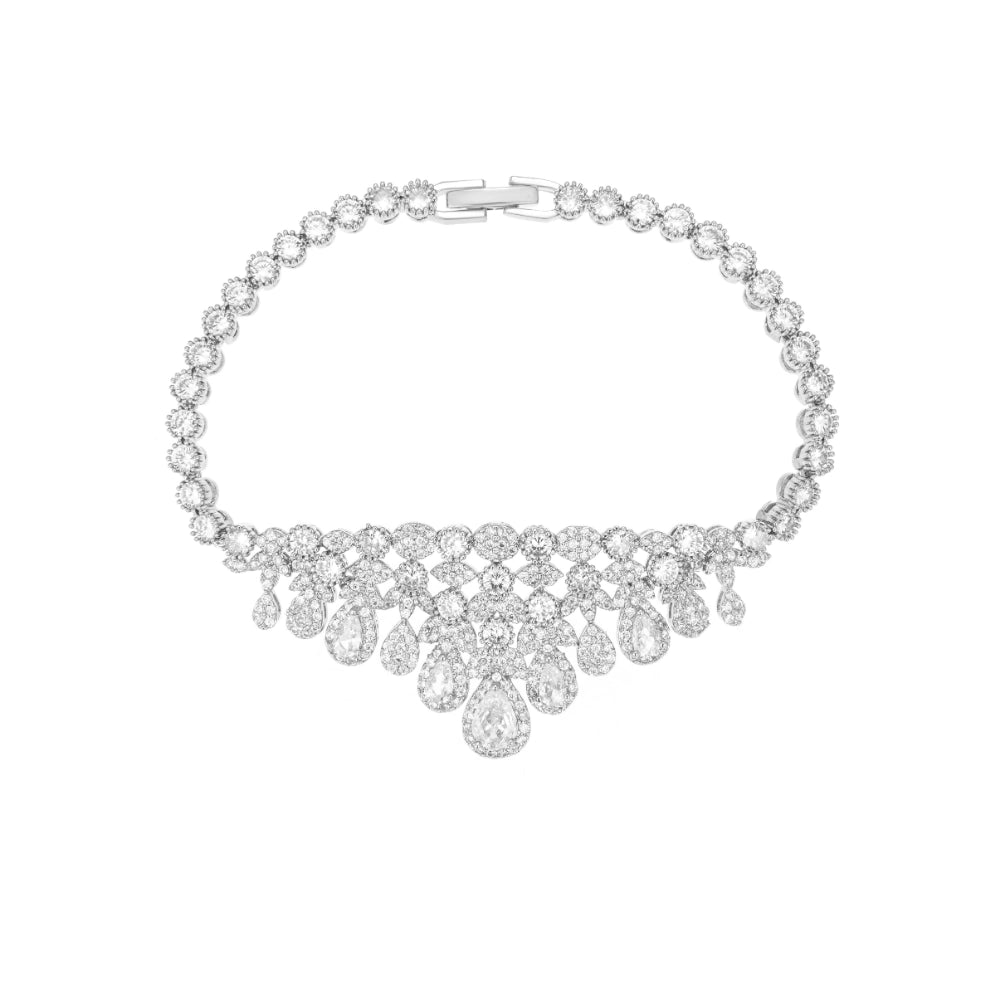 Crystal clear cubic zirconia bridal jewelry set with silver-tone finish. Includes necklace, ring, earrings, and bracelet for weddings and formal wear