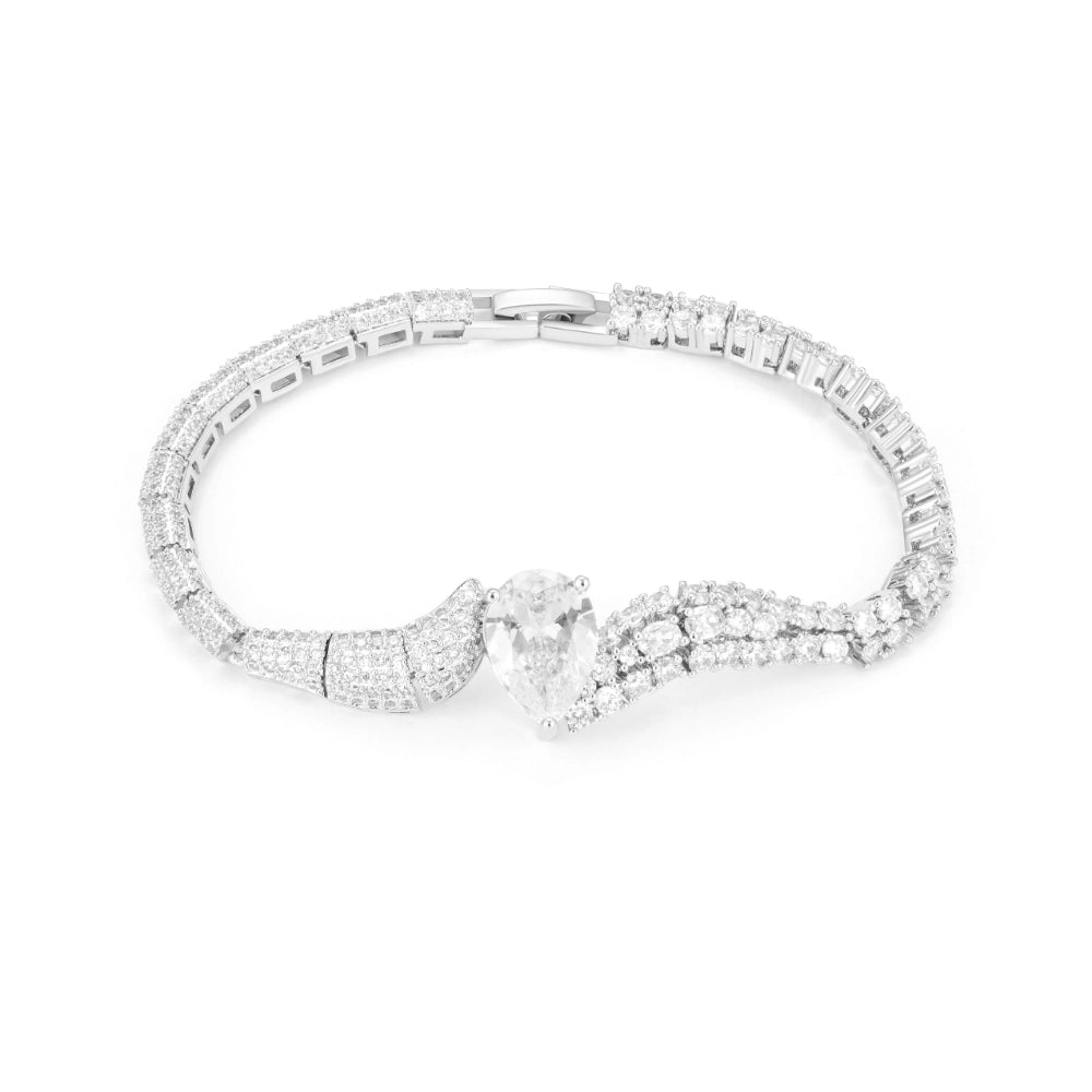 Crystal clear cubic zirconia jewelry set with silver-tone finish. Includes necklace, ring, earrings, and bracelet for weddings and formal wear