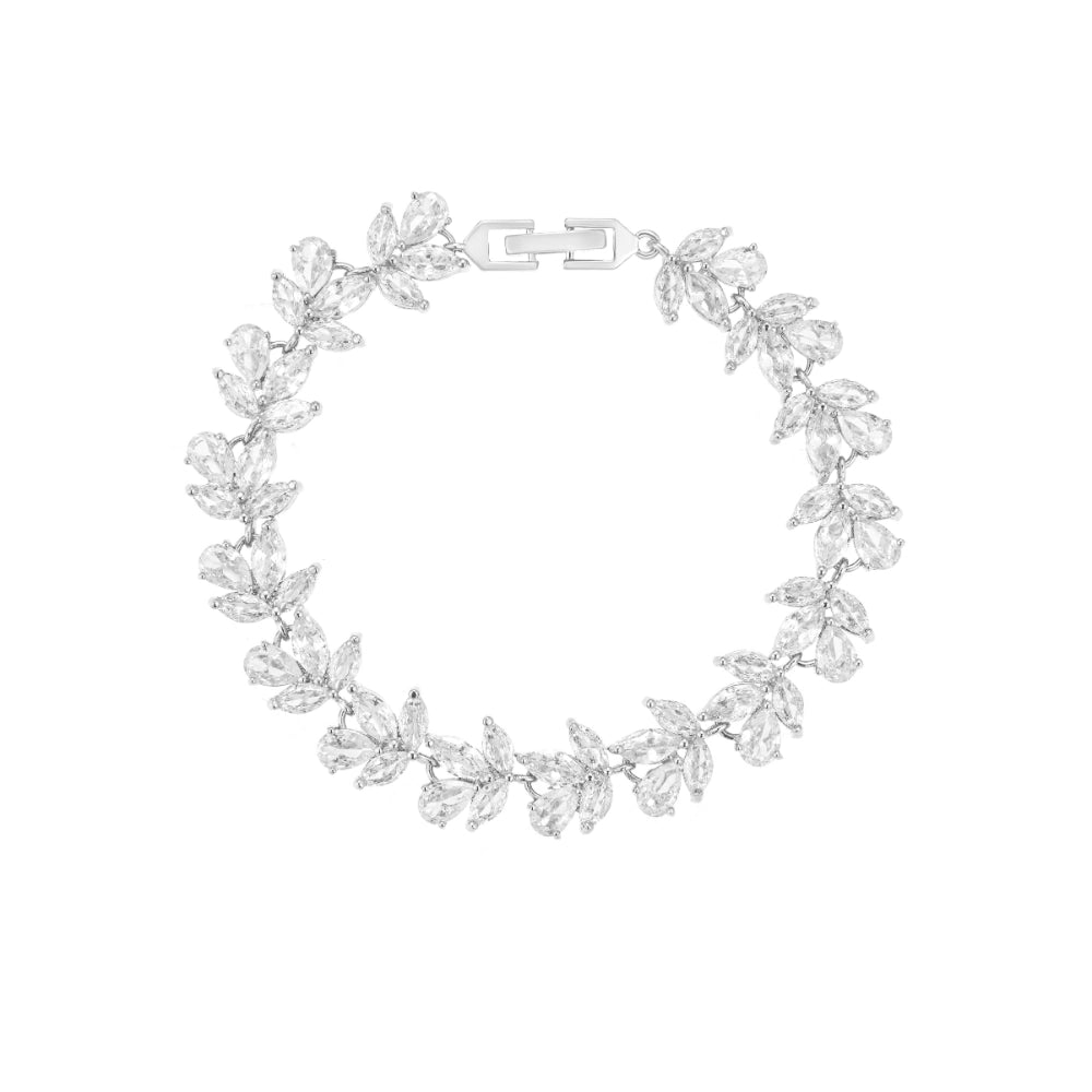 Crystal clear zircon jewelry set with silver-tone finish. Includes necklace, ring, earrings, and bracelet for weddings and formal wear