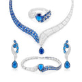 Emerald green and sapphire blue zircon jewelry set with silver-plated copper. Includes necklace, ring, earrings, and bracelet for weddings and formal wear