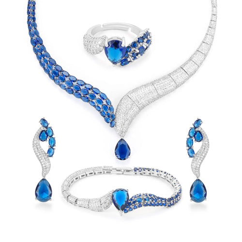 Emerald green and sapphire blue zircon jewelry set with silver-plated copper. Includes necklace, ring, earrings, and bracelet for weddings and formal wear