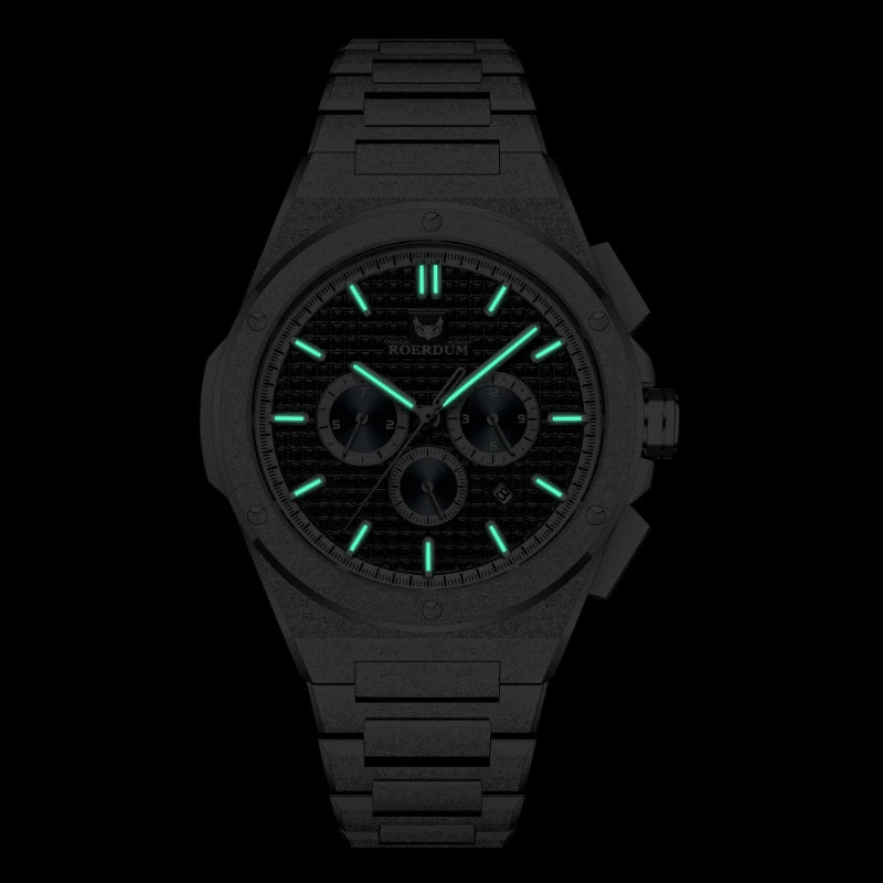 Green luminous hands and hour markers on black waffle dial octagonal watch in dark