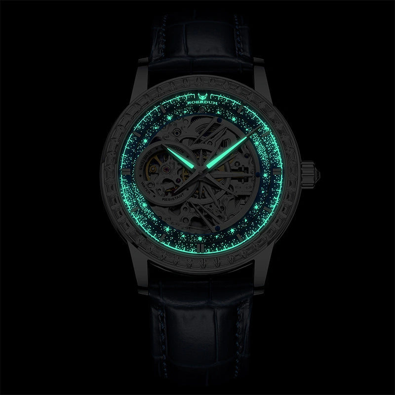 Green luminous glowing hands and starry celestial dial on men's skeleton watch in the dark   