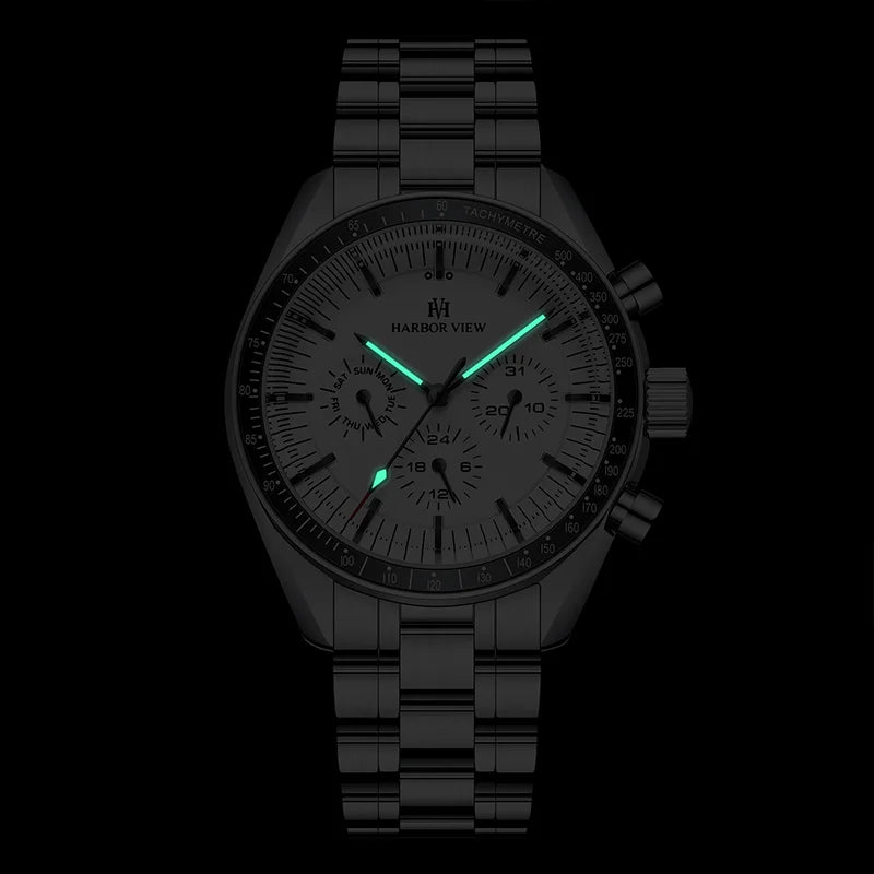 Glowing green luminous hands and pointer of the white panda mechanical watch in the dark