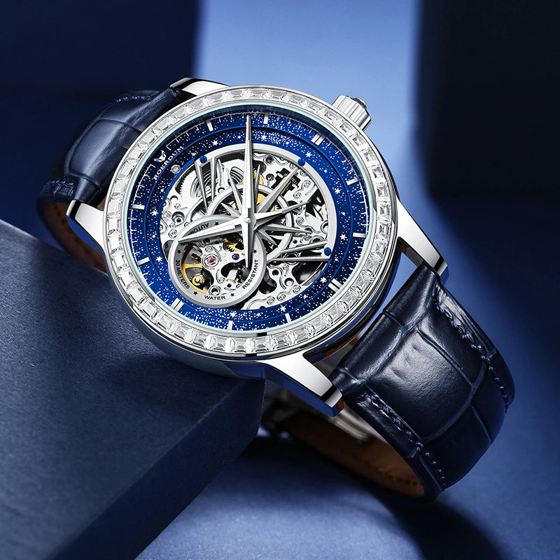 Luxury men's celestial skeleton watch displayed on dark blue presentation box