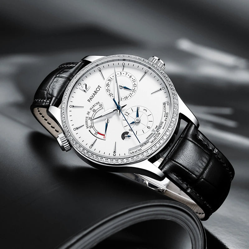 Men's luxury white dial automatic watch displayed on dark leather background