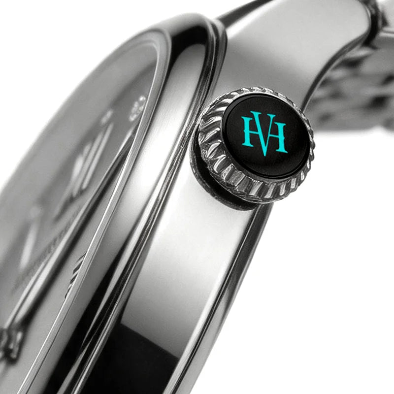 Close-up side profile showcasing the textured watch crown and polished stainless steel case