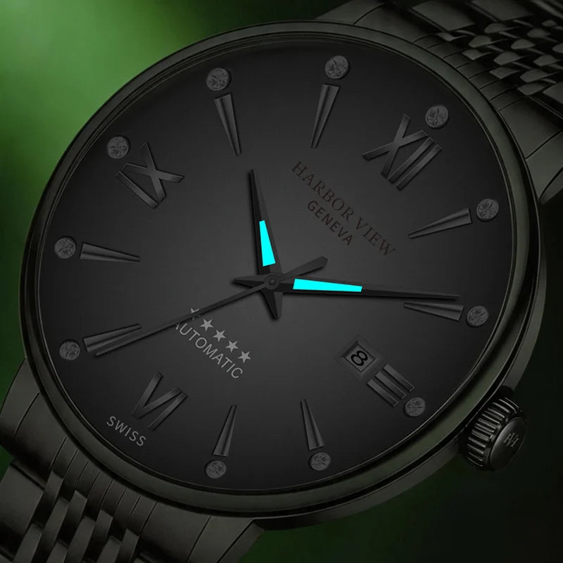 Glowing luminous hands and hour markers of the automatic dress watch in a low-light environment