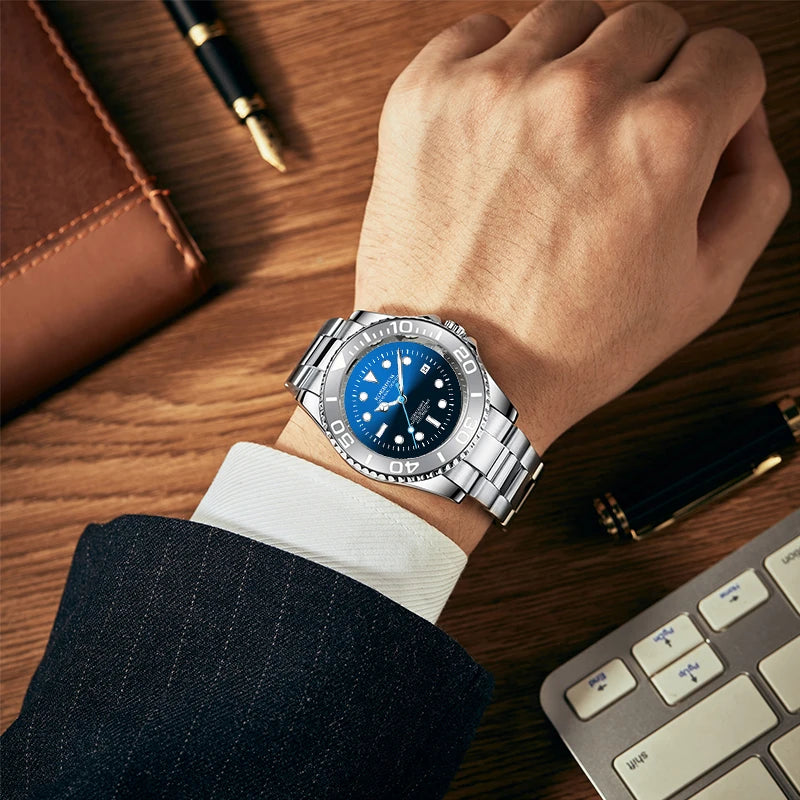 Gentleman wearing ocean blue steel watch at office desk near notebook and fountain pen   