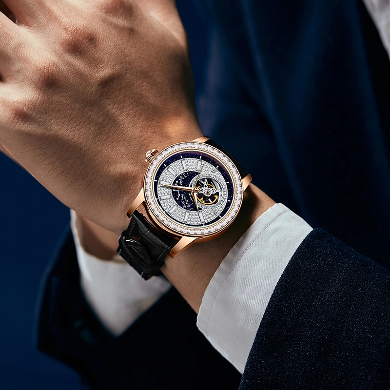Side view of the rose gold-tone stainless steel watch case and adjustment crown