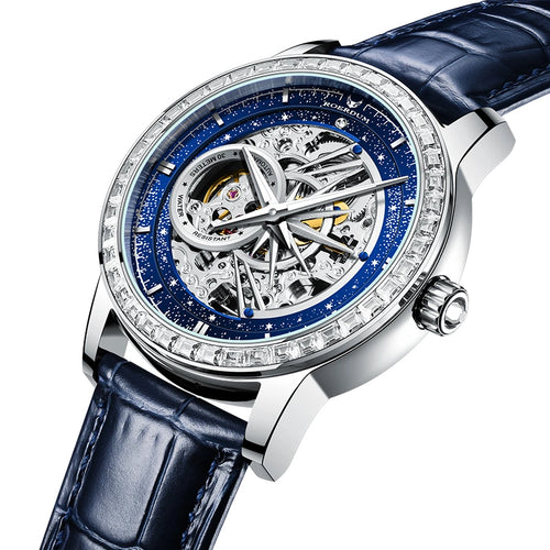 Angled close-up of 42mm celestial watch showing crystal-paved bezel and hollow mechanical movement