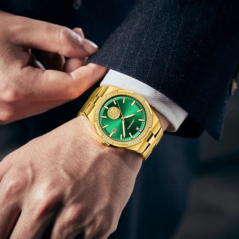 Wrist shot of a man wearing a gold mechanical watch with a navy suit