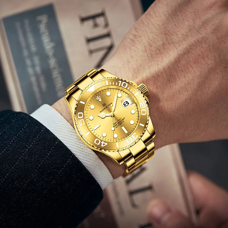 Close-up of a men's gold mechanical watch worn on wrist while adjusting a suit jacket
