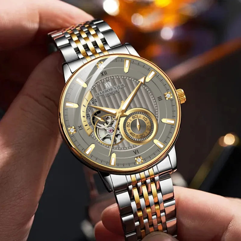 Angled side view of the grey guilloche dial automatic watch with two-tone bracelet