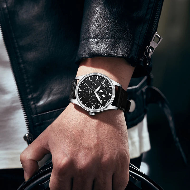 Man wearing black dial pilot automatic mechanical watch paired with a stylish black leather jacket   