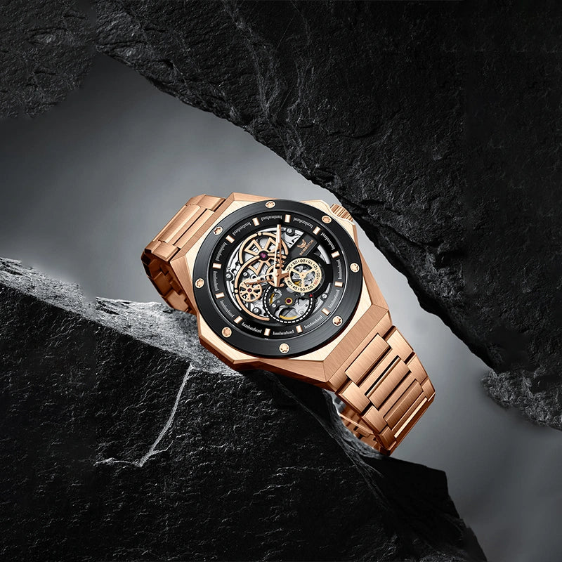 Luxury rose gold skeleton watch displayed on dark stone background showcasing hollow movement   