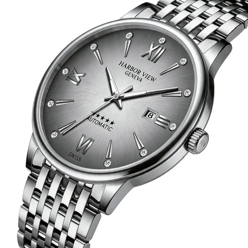 Angled close-up of the grey dial automatic watch highlighting the diamond markers and date display