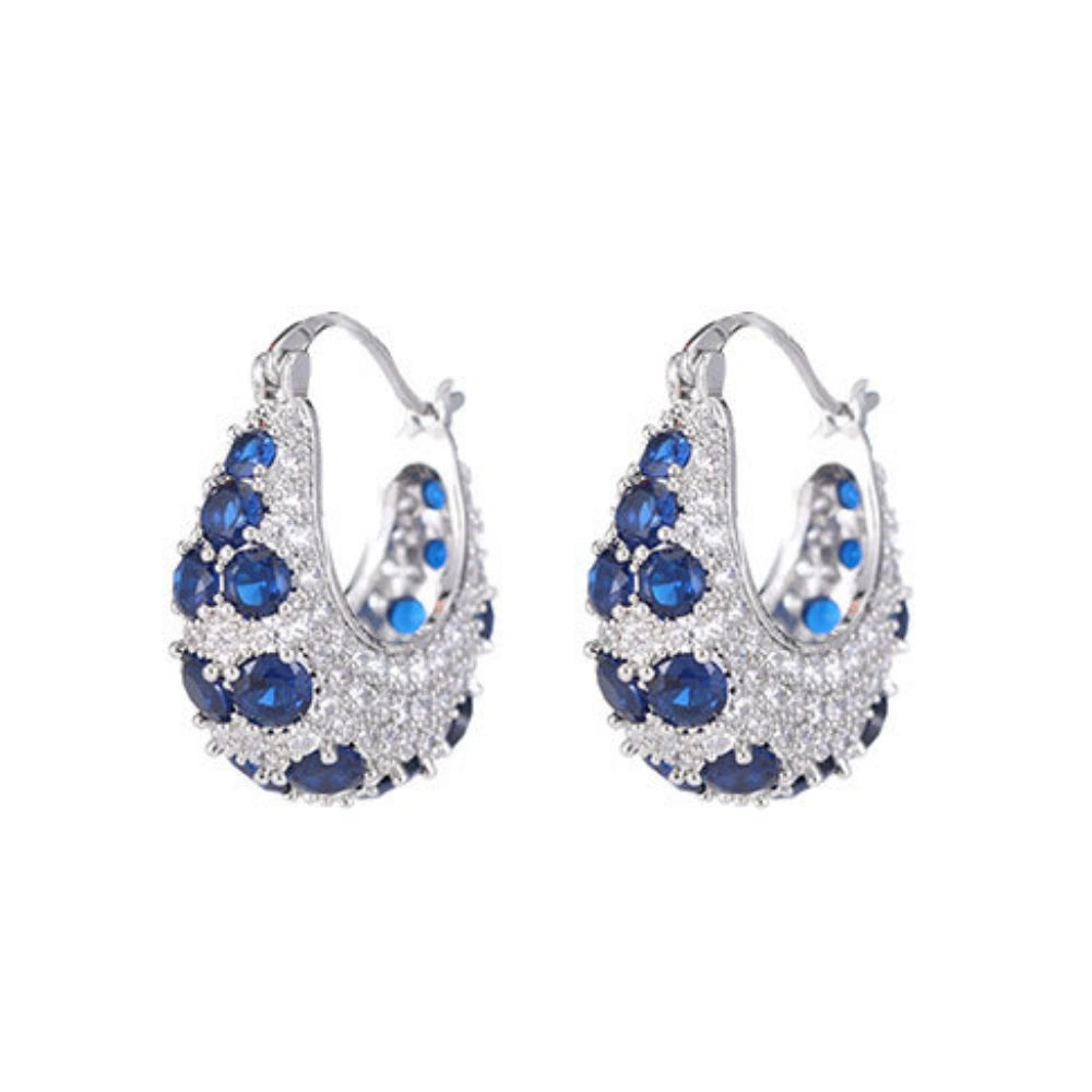 Vintage emerald green cubic zirconia hoop earrings with silver-plated copper. Sparkling dangle earrings for weddings and formal occasions
