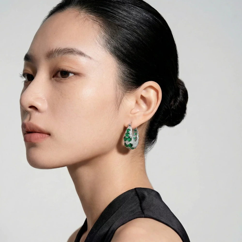 Vintage emerald green cubic zirconia hoop earrings with silver-plated copper. Sparkling dangle earrings for weddings and formal occasions