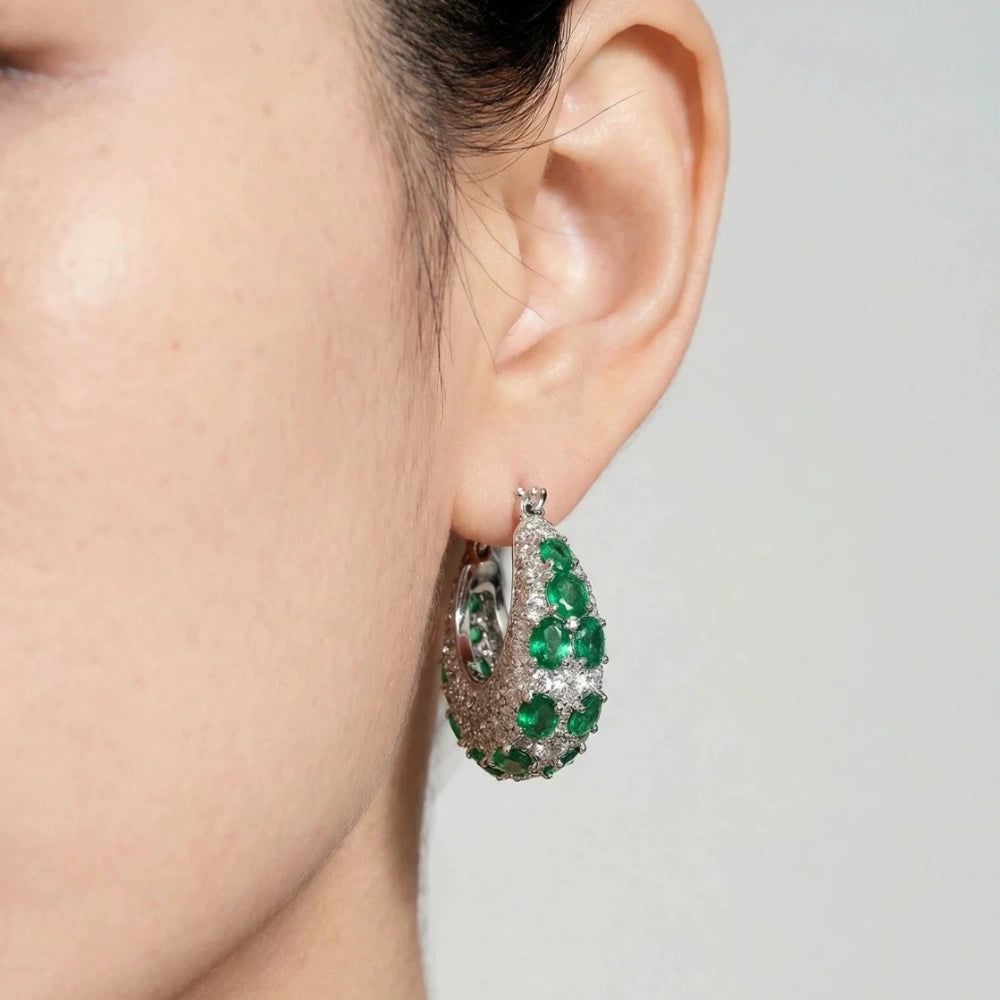 Vintage emerald green cubic zirconia hoop earrings with silver-plated copper. Sparkling dangle earrings for weddings and formal occasions