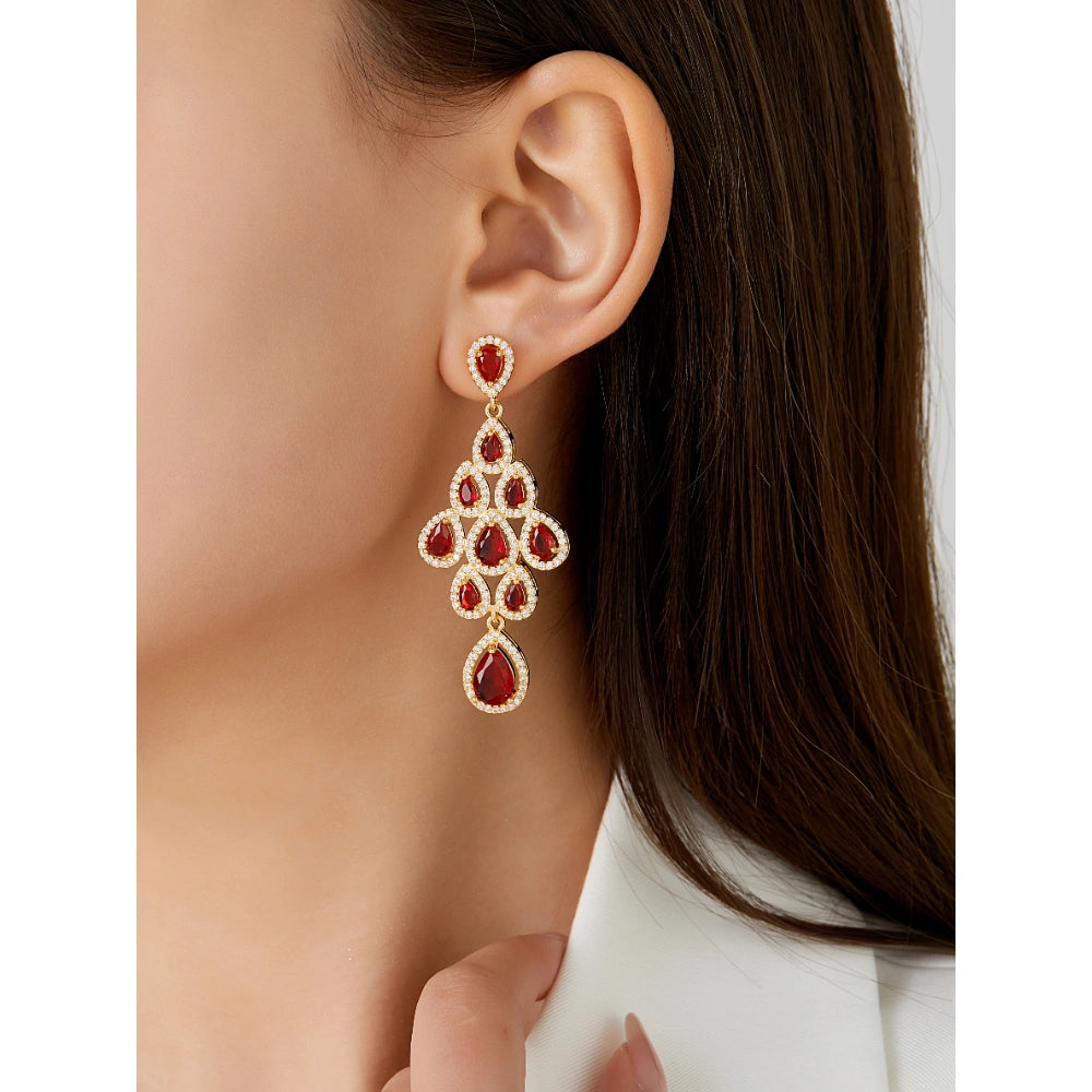 Vintage ruby red cubic zirconia chandelier earrings with gold-plated copper. Sparkling dangle earrings for weddings and formal occasions